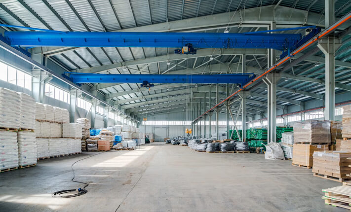 Large fulfillment warehouse with organized inventory ready for pick and pack order processing